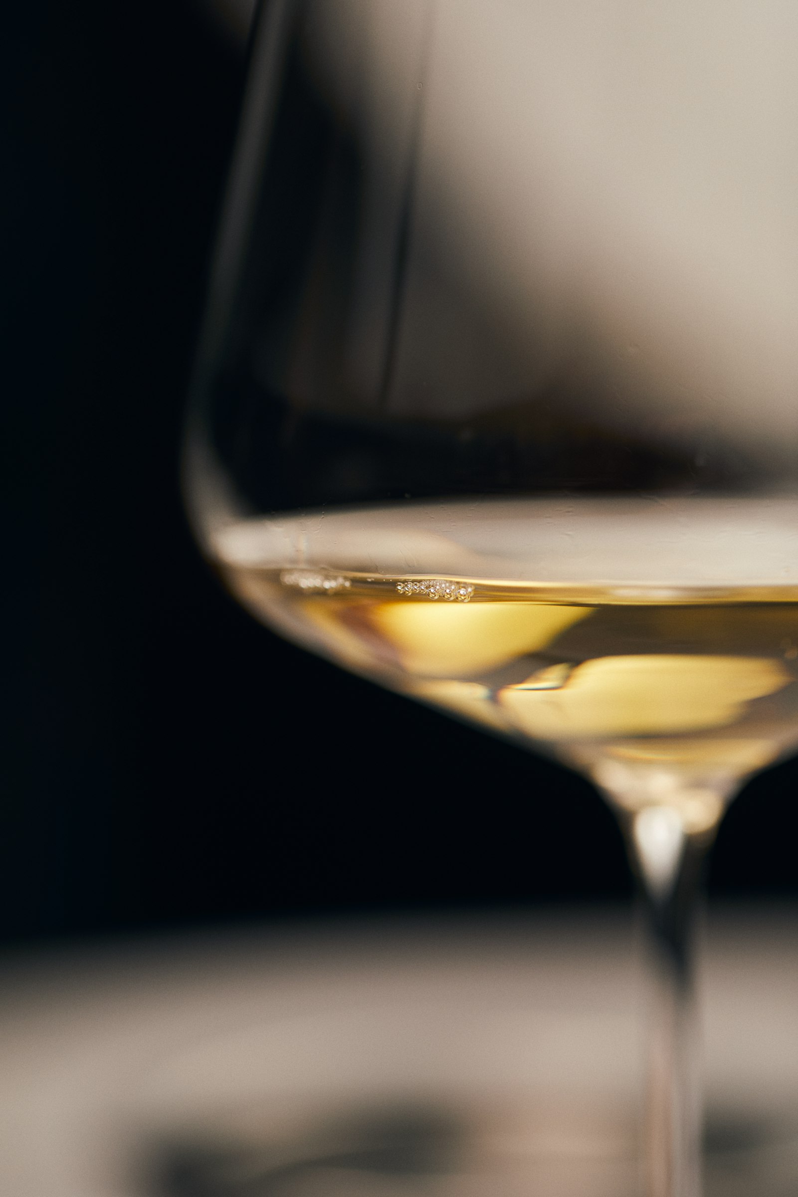 A glass of pale white Torrontes